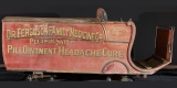 An 1890s red horse-drawn medicine wagon